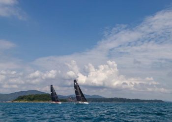 Phuket King’s Cup, Day 5. The wind has arrived at last. Not huge, but plenty enough for a couple of short races round the cans and a trip round the bushes.